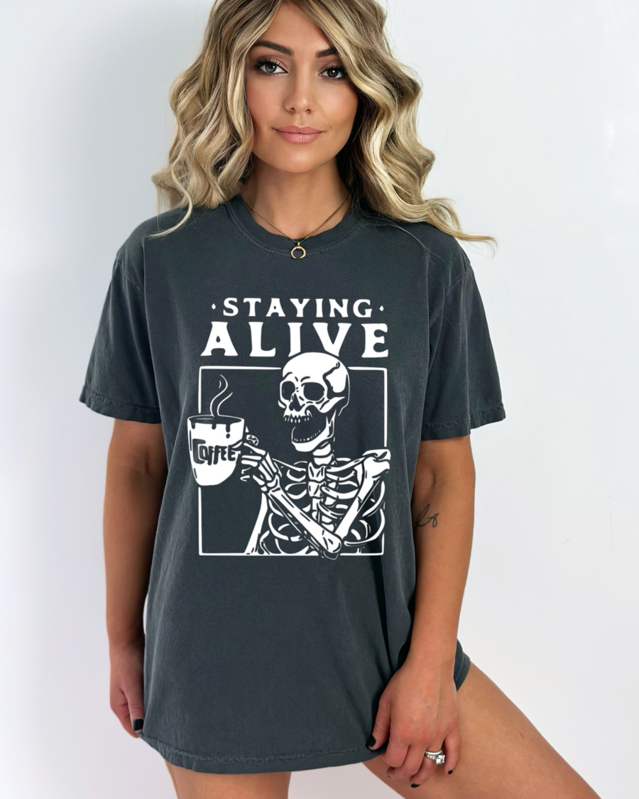 Skeleton Staying Alive With Coffee Graphic Tee